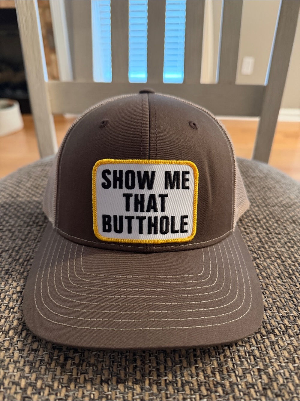 Brown Trucker Cap with 'Show Me That Butthole' Patch